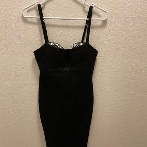 Black cocktail dress with peekaboo bra 32B.